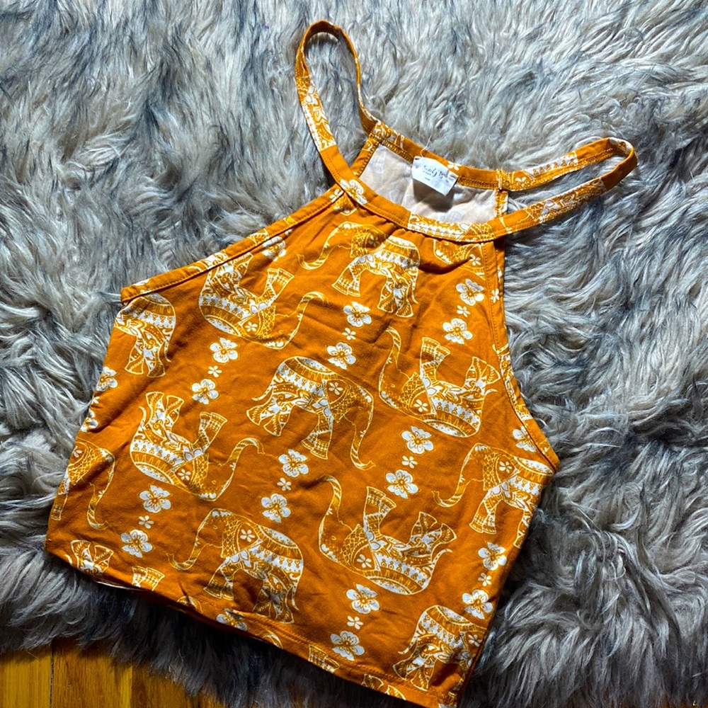 Orange halter crop top with elephant pattern